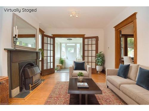 33 Cline Avenue S, Hamilton, ON - Indoor Photo Showing Living Room With Fireplace