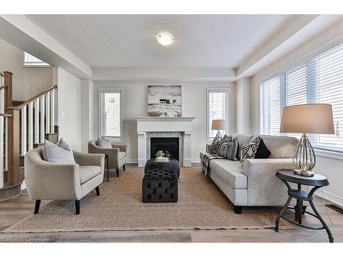 99 Kenesky Drive, Waterdown, ON - Indoor Photo Showing Living Room With Fireplace