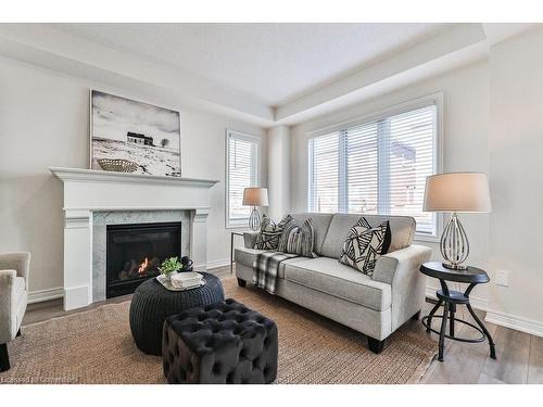 99 Kenesky Drive, Waterdown, ON - Indoor Photo Showing Living Room With Fireplace