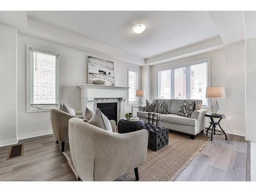 99 Kenesky Drive, Waterdown, ON - Indoor Photo Showing Living Room With Fireplace