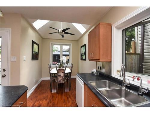 207 East 24Th Street, Hamilton, ON - Indoor Photo Showing Kitchen With Double Sink