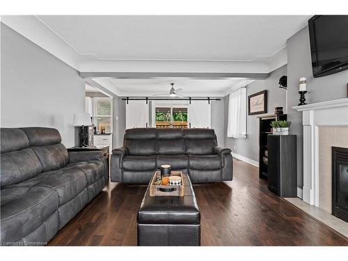 18 Irving Place, Hamilton, ON - Indoor Photo Showing Living Room With Fireplace