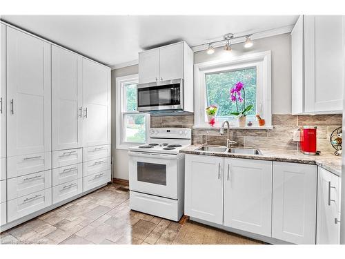 232 West 19Th Street, Hamilton, ON - Indoor Photo Showing Kitchen With Double Sink