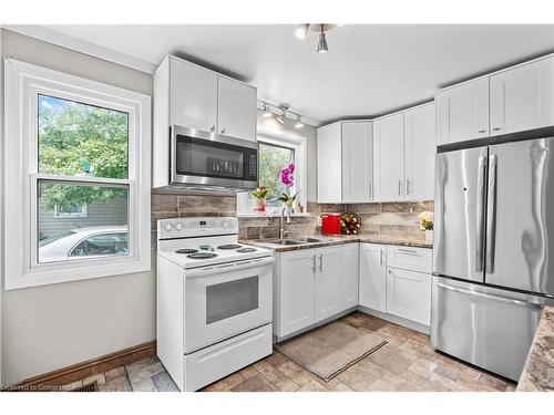 232 West 19Th Street, Hamilton, ON - Indoor Photo Showing Kitchen With Double Sink