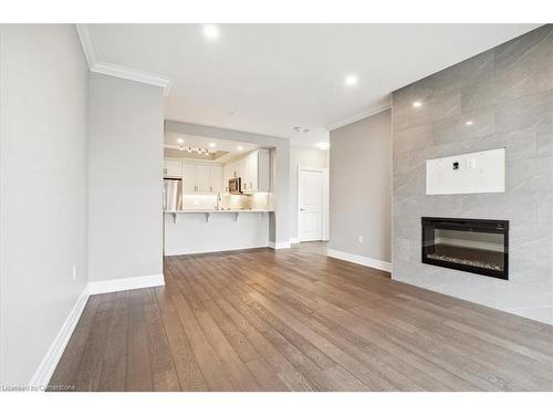 403-1878 Gordon Street, Guelph, ON - Indoor Photo Showing Living Room With Fireplace