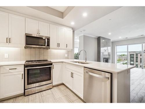 403-1878 Gordon Street, Guelph, ON - Indoor Photo Showing Kitchen With Stainless Steel Kitchen With Double Sink With Upgraded Kitchen