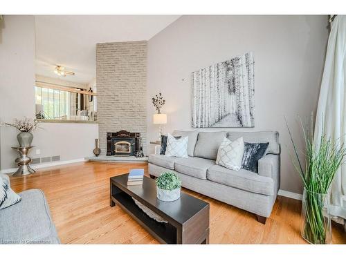 2358 Cavendish Drive, Burlington, ON - Indoor Photo Showing Living Room With Fireplace