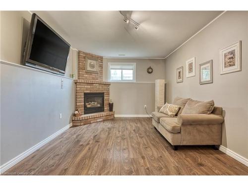 25 Cork Crescent, Brantford, ON - Indoor Photo Showing Living Room With Fireplace