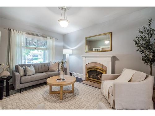 90 Blake Street, Hamilton, ON - Indoor Photo Showing Living Room With Fireplace