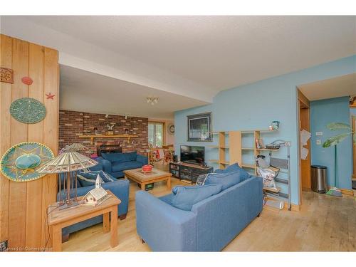 1218 Highway 8, Stoney Creek, ON - Indoor Photo Showing Living Room With Fireplace