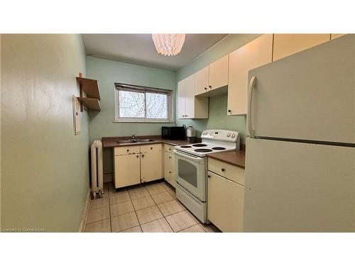 3-285 King Street W, Hamilton, ON - Indoor Photo Showing Kitchen With Double Sink