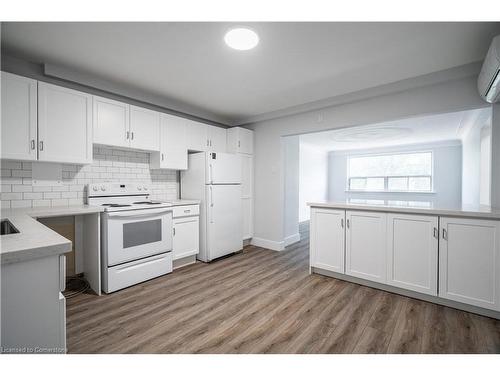 4-2161 Ghent Avenue, Burlington, ON - Indoor Photo Showing Kitchen With Double Sink