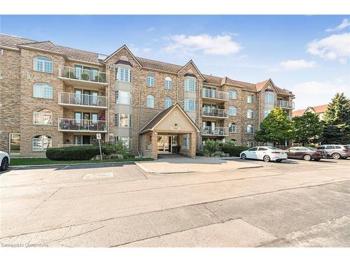 B405-216 Plains Road W, Burlington, ON - Outdoor With Balcony With Facade