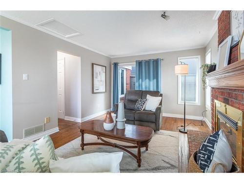 48 Karsh Crescent, Hamilton, ON - Indoor Photo Showing Living Room With Fireplace