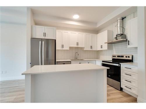 405-153 Wilson Street W, Ancaster, ON - Indoor Photo Showing Kitchen With Upgraded Kitchen