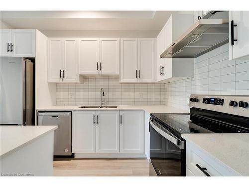 405-153 Wilson Street W, Ancaster, ON - Indoor Photo Showing Kitchen With Double Sink With Upgraded Kitchen