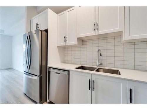 405-153 Wilson Street W, Ancaster, ON - Indoor Photo Showing Kitchen With Double Sink With Upgraded Kitchen