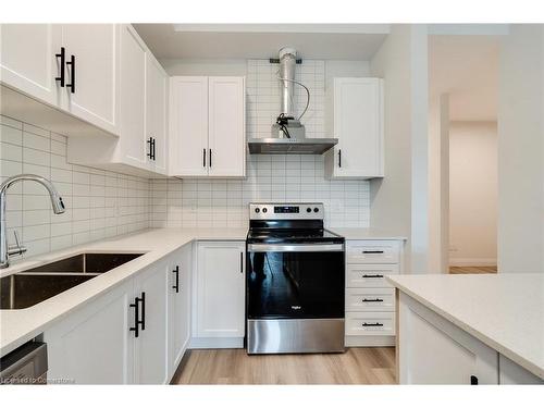 405-153 Wilson Street W, Ancaster, ON - Indoor Photo Showing Kitchen With Double Sink With Upgraded Kitchen