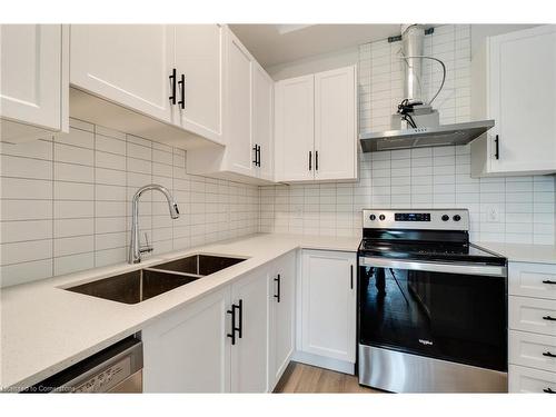 405-153 Wilson Street W, Ancaster, ON - Indoor Photo Showing Kitchen With Double Sink With Upgraded Kitchen