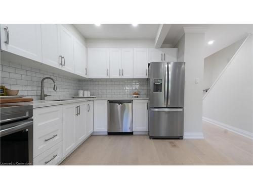 17-2411 Sovereign Street, Oakville, ON - Indoor Photo Showing Kitchen With Stainless Steel Kitchen