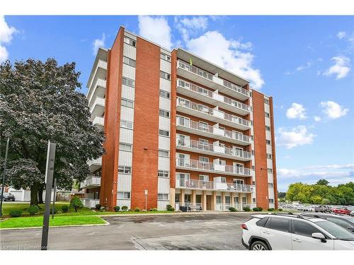 408-10 Woodman Drive S, Hamilton, ON - Outdoor With Balcony With Facade