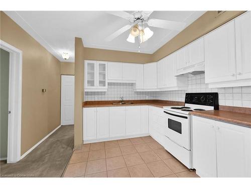 408-10 Woodman Drive S, Hamilton, ON - Indoor Photo Showing Kitchen With Double Sink