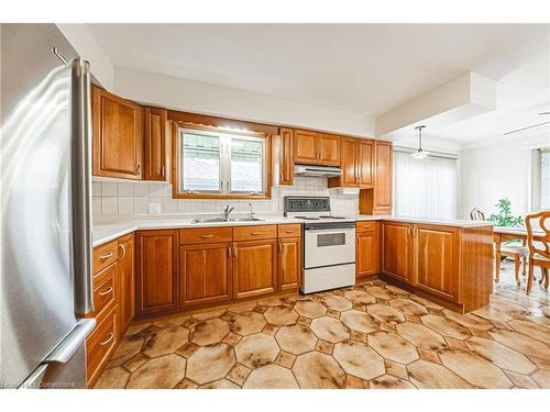 83 South Bend Road W, Hamilton, ON - Indoor Photo Showing Kitchen With Double Sink