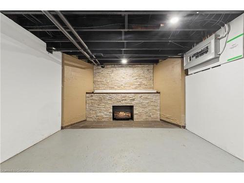 73 Talbot Street N, Simcoe, ON - Indoor Photo Showing Basement With Fireplace