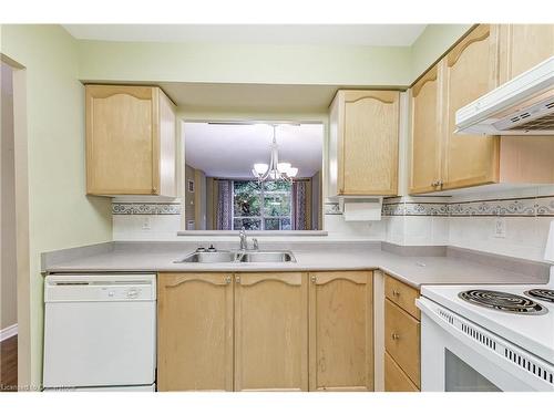 1208-100 Burloak Drive, Burlington, ON - Indoor Photo Showing Kitchen With Double Sink