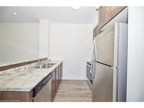 437-16 Concord Place, Grimsby, ON - Indoor Photo Showing Kitchen With Double Sink