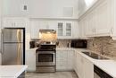 317-170 Rockhaven Lane, Waterdown, ON  - Indoor Photo Showing Kitchen With Stainless Steel Kitchen With Double Sink 