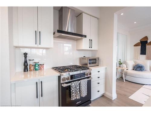 128 Fairey Crescent, Mount Hope, ON - Indoor Photo Showing Kitchen With Upgraded Kitchen