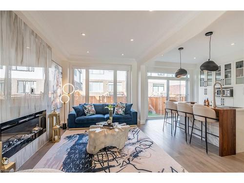 128 Fairey Crescent, Mount Hope, ON - Indoor Photo Showing Living Room With Fireplace