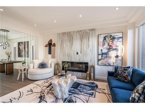 128 Fairey Crescent, Mount Hope, ON - Indoor Photo Showing Living Room With Fireplace