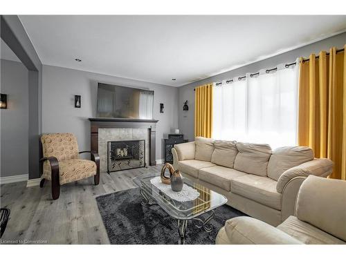 21 Hillgarden Road, St. Catharines, ON - Indoor Photo Showing Living Room With Fireplace