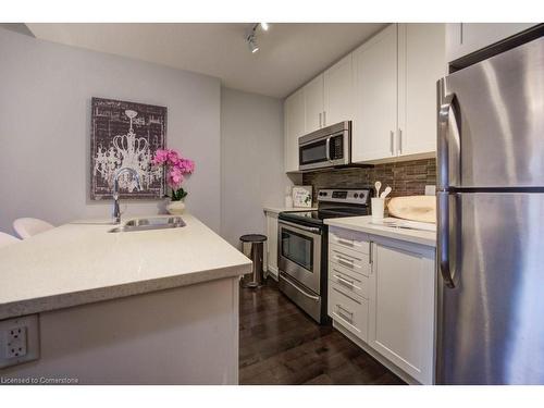 404-90 Charlton Avenue W, Hamilton, ON - Indoor Photo Showing Kitchen With Stainless Steel Kitchen With Double Sink