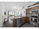 1110-65 Speers Road, Oakville, ON  - Indoor Photo Showing Kitchen With Stainless Steel Kitchen 