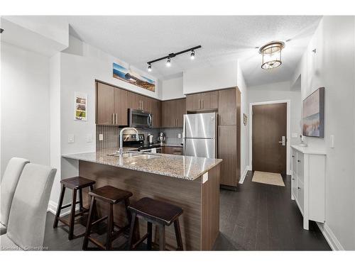 1110-65 Speers Road, Oakville, ON - Indoor Photo Showing Kitchen With Stainless Steel Kitchen