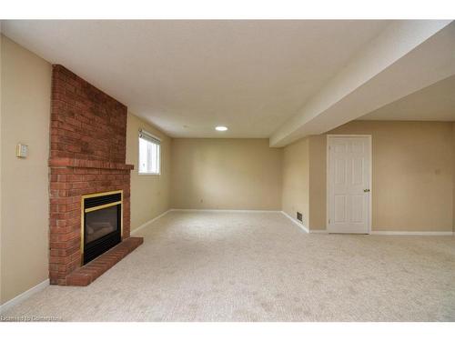 15 Broughton Avenue, Hamilton, ON - Indoor With Fireplace