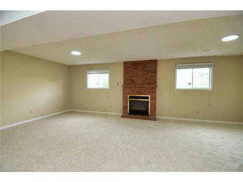 15 Broughton Avenue, Hamilton, ON - Indoor With Fireplace