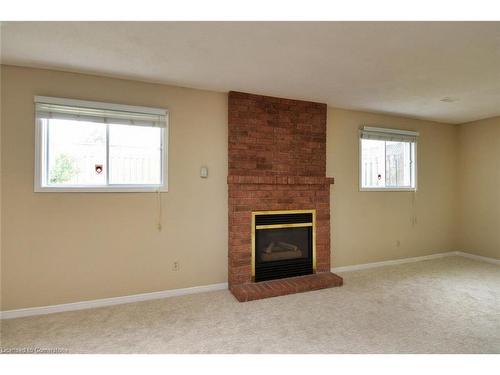 15 Broughton Avenue, Hamilton, ON - Indoor Photo Showing Living Room With Fireplace