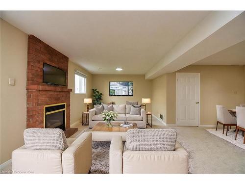 15 Broughton Avenue, Hamilton, ON - Indoor Photo Showing Living Room With Fireplace