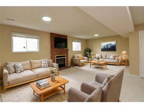 15 Broughton Avenue, Hamilton, ON - Indoor Photo Showing Living Room With Fireplace