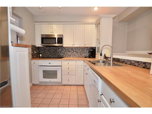 1-1564 Kerns Road, Burlington, ON - Indoor Photo Showing Kitchen With Double Sink