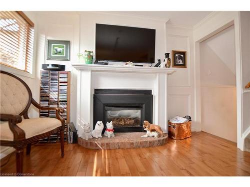 1-1564 Kerns Road, Burlington, ON - Indoor Photo Showing Living Room With Fireplace