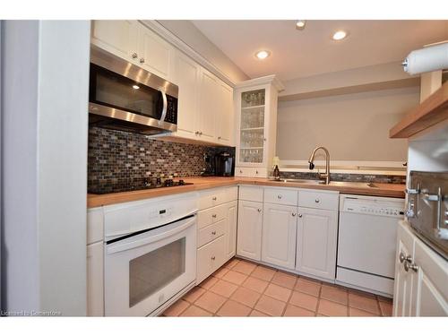 1-1564 Kerns Road, Burlington, ON - Indoor Photo Showing Kitchen With Double Sink