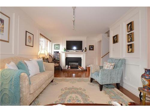 1-1564 Kerns Road, Burlington, ON - Indoor Photo Showing Living Room With Fireplace