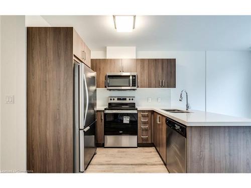 102-479 Charlton Avenue E, Hamilton, ON - Indoor Photo Showing Kitchen With Stainless Steel Kitchen With Double Sink With Upgraded Kitchen