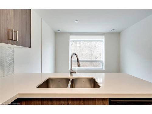 102-479 Charlton Avenue E, Hamilton, ON - Indoor Photo Showing Kitchen With Double Sink