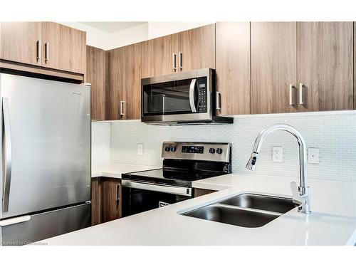 102-479 Charlton Avenue E, Hamilton, ON - Indoor Photo Showing Kitchen With Stainless Steel Kitchen With Double Sink With Upgraded Kitchen